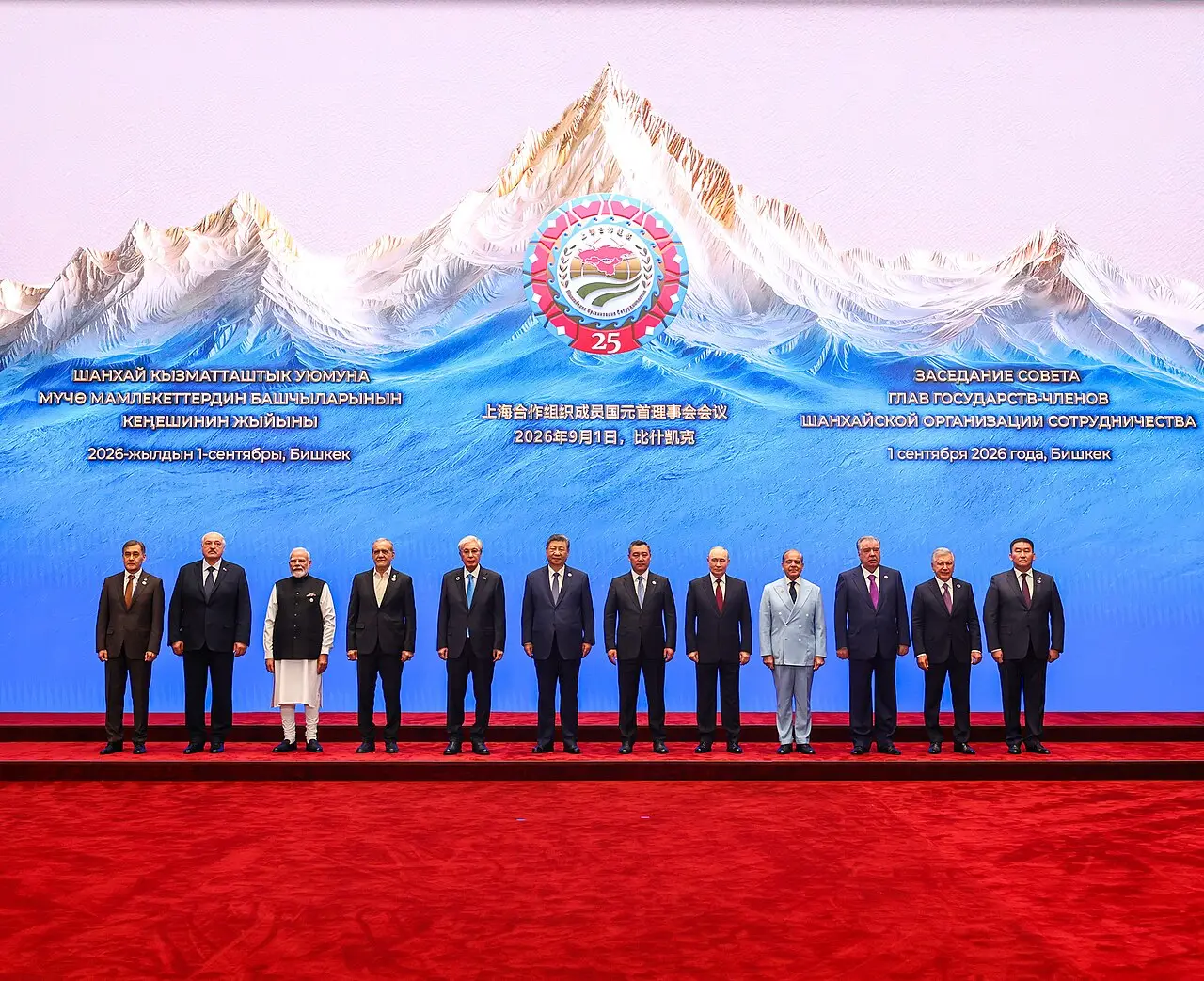 Leaders of Shanghai Cooperation Organisation member states stand in a row for a group photo at the 2026 Bishkek summit.