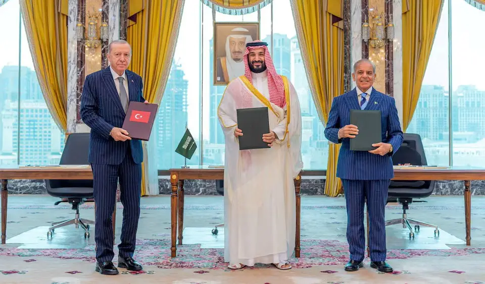 Turkish President Tayyip Erdogan, Saudi Crown Prince Mohammed bin Salman and Pakistan’s Prime Minister Shehbaz Sharif pose after signing a joint defence agreement in Mecca, Saudi Arabia, on August 7, 2026.